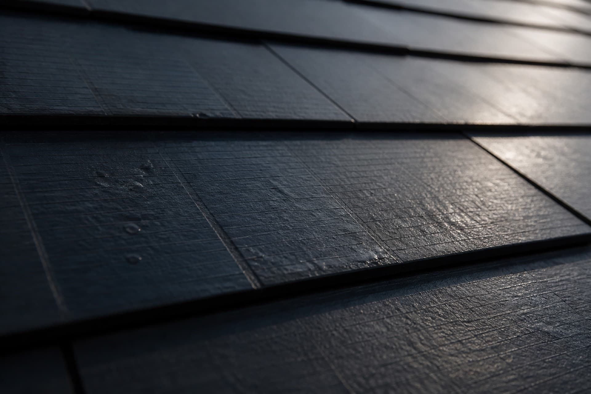 Close-up of dark solar roof tiles